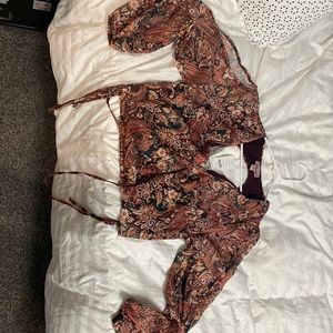 Blouse brown color with green and maroon willow root from the buckle